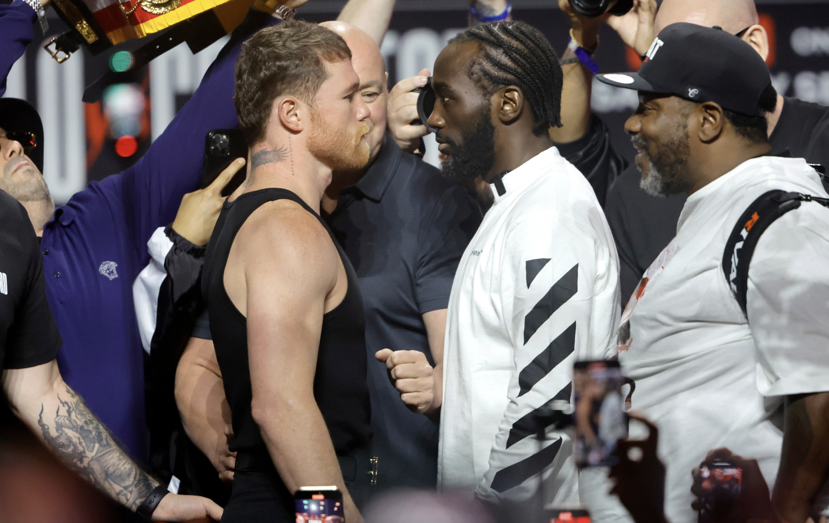 Canelo and Crawford Weigh in Identical Canelo and Crawford Weigh in Identical